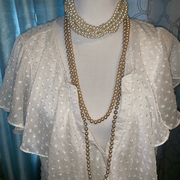 Vince Camuto Tops - Cream flow top. Sexy front-low buttons.